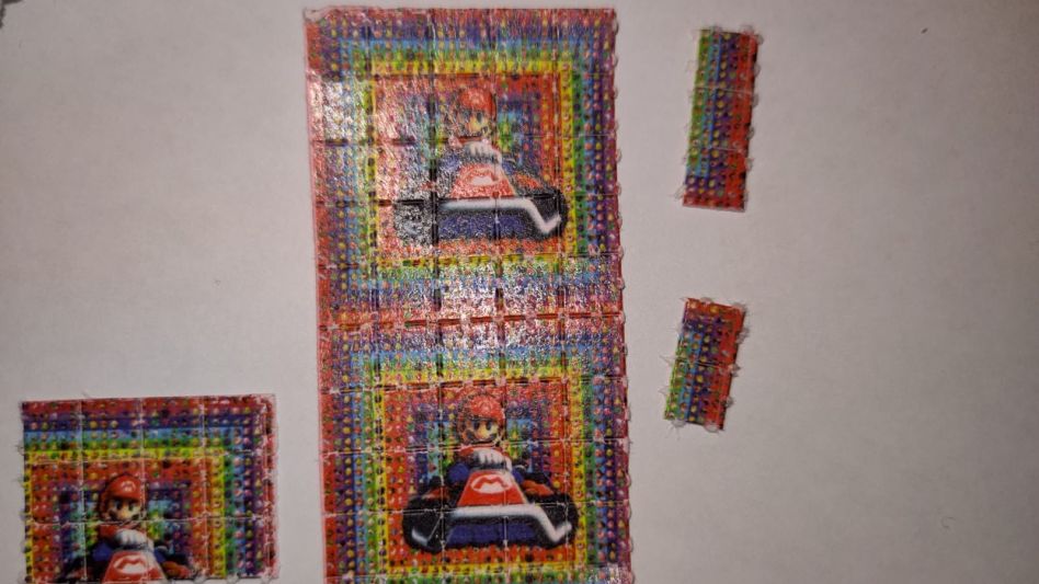 Los troqueles de LSD incautados estaban diseñados con la imagen de Mario Bros.  ARCHIVO/EPDS AZUL/PBA